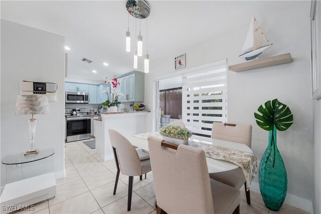 dining space with baseboards, visible vents, recessed lighting, and light tile patterned floors