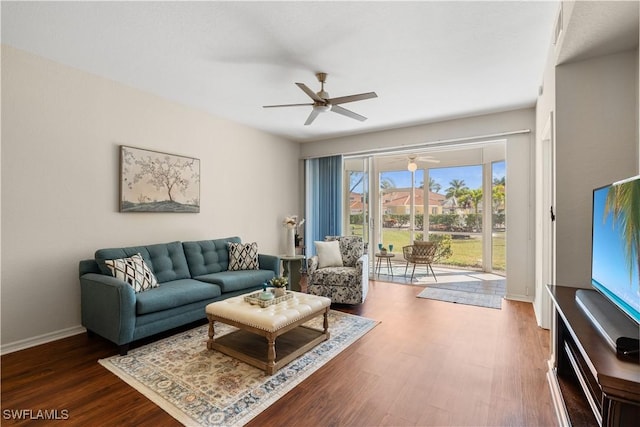 1758 Reuven Cir Unit 1503, Naples, FL 34112 - living area featuring ceiling fan, wood finished floors, and baseboards
