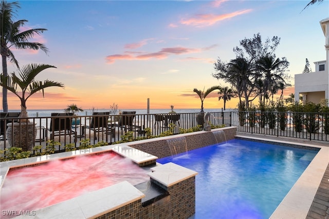26628 Hickory Blvd, Bonita Springs, FL 34134 - pool at dusk with a water view