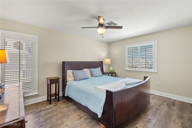26628 Hickory Blvd, Bonita Springs, FL 34134 - bedroom featuring multiple windows, wood finished floors, and ceiling fan