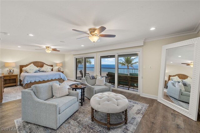 26628 Hickory Blvd, Bonita Springs, FL 34134 - bedroom with access to exterior, crown molding, recessed lighting, a water view, and wood finished floors