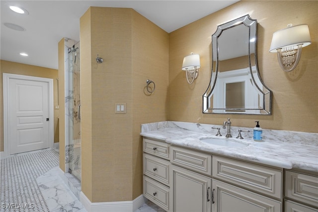 26628 Hickory Blvd, Bonita Springs, FL 34134 - bathroom featuring marble finish flooring, a stall shower, vanity, and recessed lighting