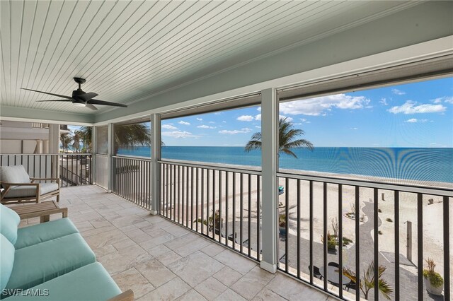 26628 Hickory Blvd, Bonita Springs, FL 34134 - sunroom featuring view of water and beach and ceiling fan