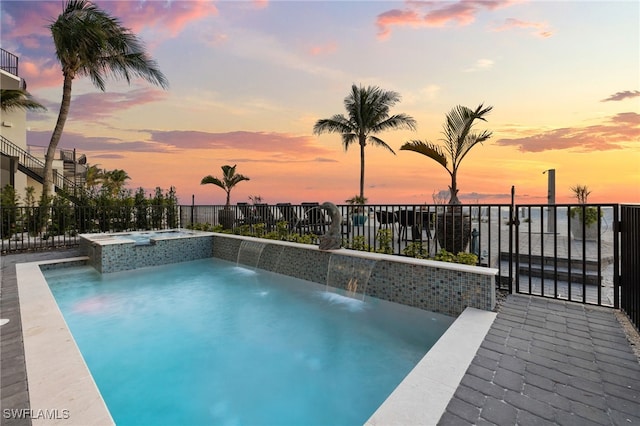 26628 Hickory Blvd, Bonita Springs, FL 34134 - pool at dusk with a pool with connected hot tub
