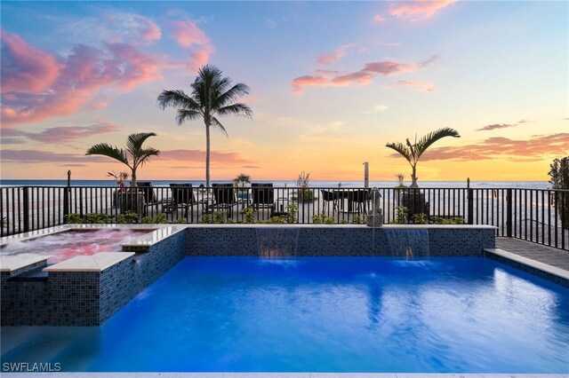 26628 Hickory Blvd, Bonita Springs, FL 34134 - view of pool with a hot tub and a water view