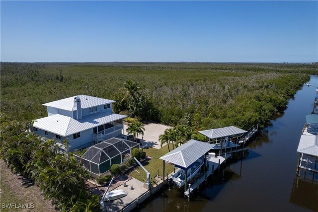 7940 Lobean Ln, Bokeelia, FL 33922 - drone / aerial view of a heavily wooded area and a large body of water