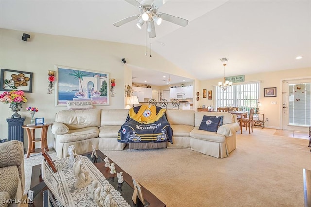 living area featuring light colored carpet, vaulted ceiling, ceiling fan with notable chandelier, visible vents, and recessed lighting
