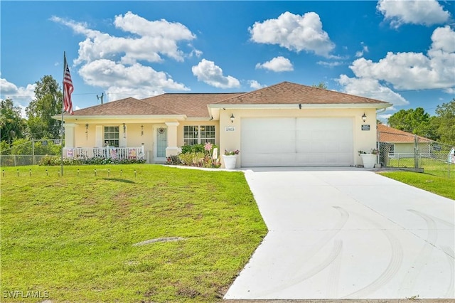 ranch-style house featuring driveway, fence, a garage, a front yard, and stucco siding