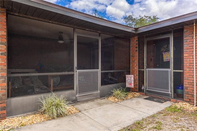 310 Trader Rd, Fort Denaud, FL 33935 - view of exterior entry featuring brick siding