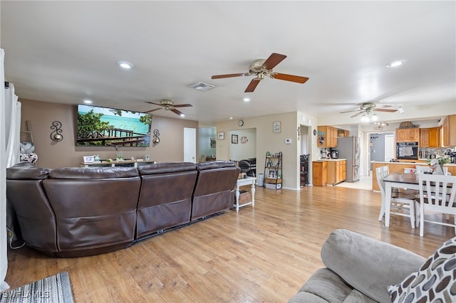 310 Trader Rd, Fort Denaud, FL 33935 - living room with light wood-type flooring, a ceiling fan, recessed lighting, and visible vents