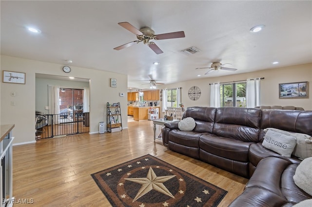 310 Trader Rd, Fort Denaud, FL 33935 - living area featuring light wood-type flooring, recessed lighting, baseboards, ceiling fan, and visible vents