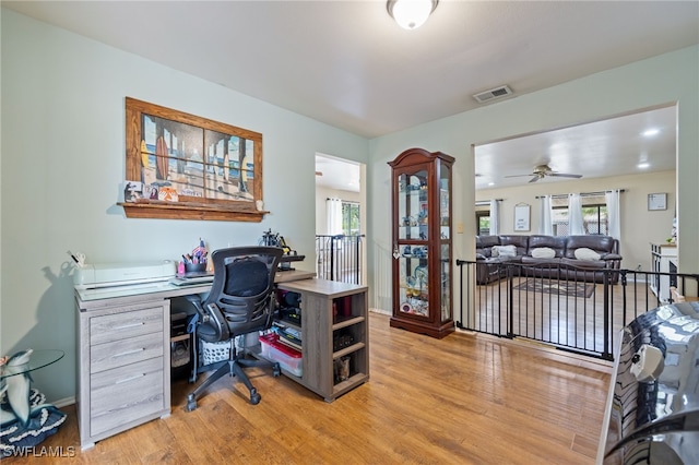 310 Trader Rd, Fort Denaud, FL 33935 - office space with baseboards, ceiling fan, visible vents, and light wood finished floors