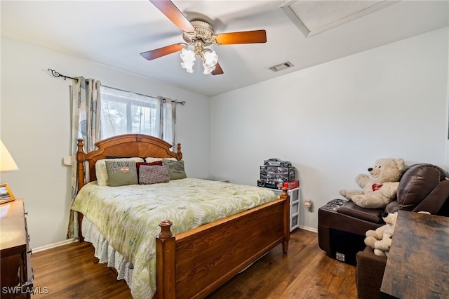310 Trader Rd, Fort Denaud, FL 33935 - bedroom featuring visible vents, baseboards, wood finished floors, a ceiling fan, and attic access