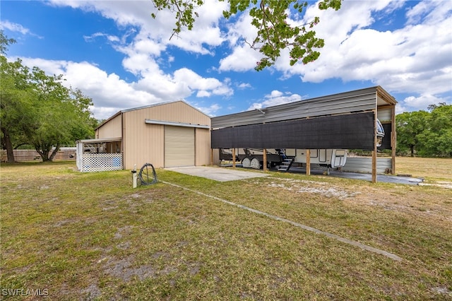 310 Trader Rd, Fort Denaud, FL 33935 - view of pole building with driveway and a yard