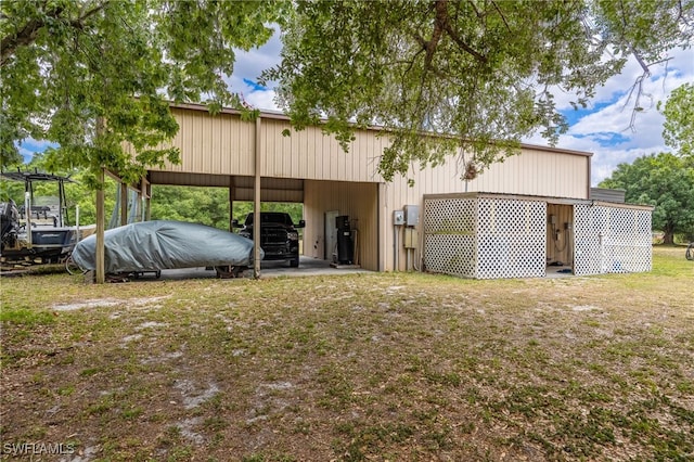 310 Trader Rd, Fort Denaud, FL 33935 - exterior space featuring a lawn and an outbuilding