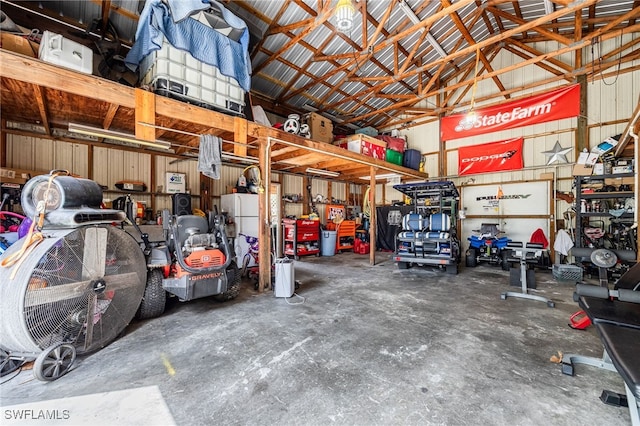 310 Trader Rd, Fort Denaud, FL 33935 - garage with freestanding refrigerator and metal wall