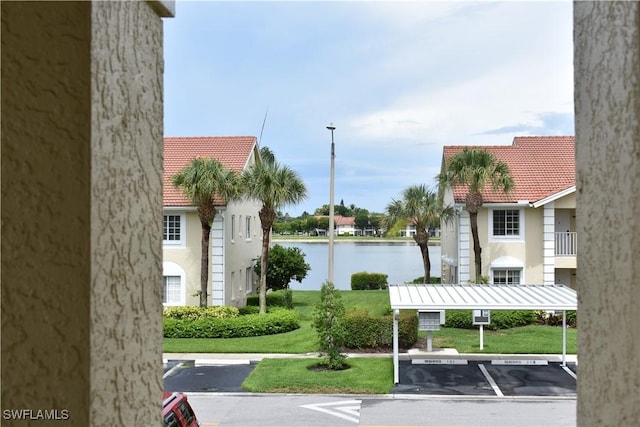 exterior space featuring a water view