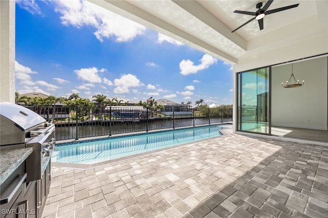view of pool with a fenced in pool, a grill, fence, ceiling fan, and a patio
