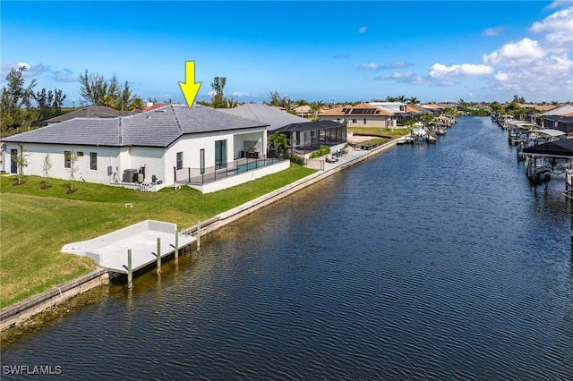 exterior space with a residential view and a dock