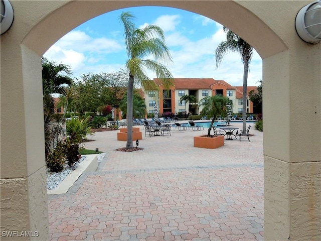 13621 Eagle Ridge Dr Unit 1518, Fort Myers, FL 33912 - view of patio / terrace with a community pool