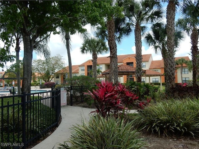 13621 Eagle Ridge Dr Unit 1518, Fort Myers, FL 33912 - surrounding community with fence and a swimming pool