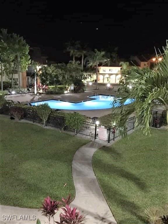 13621 Eagle Ridge Dr Unit 1518, Fort Myers, FL 33912 - view of home's community featuring fence, a pool, and a yard