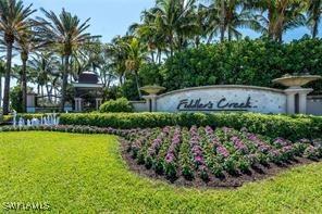 3260 Miyagi Ln, Naples, FL 34114 - community sign featuring a lawn