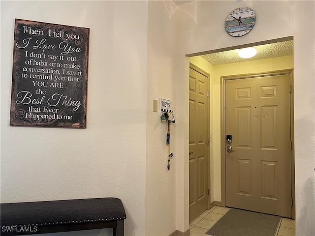 15585 Ocean Walk Cir Unit 216, Fort Myers, FL 33908 - entryway with light tile patterned floors