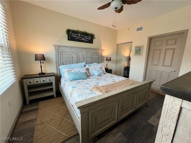 15585 Ocean Walk Cir Unit 216, Fort Myers, FL 33908 - bedroom with dark wood-style flooring and a ceiling fan