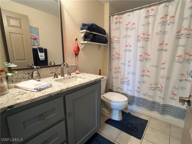15585 Ocean Walk Cir Unit 216, Fort Myers, FL 33908 - full bath featuring vanity, tile patterned floors, and a textured wall