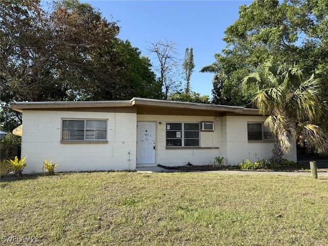 1308 Brookhill Dr, Fort Myers, FL 33916 - ranch-style home with concrete block siding and a front lawn