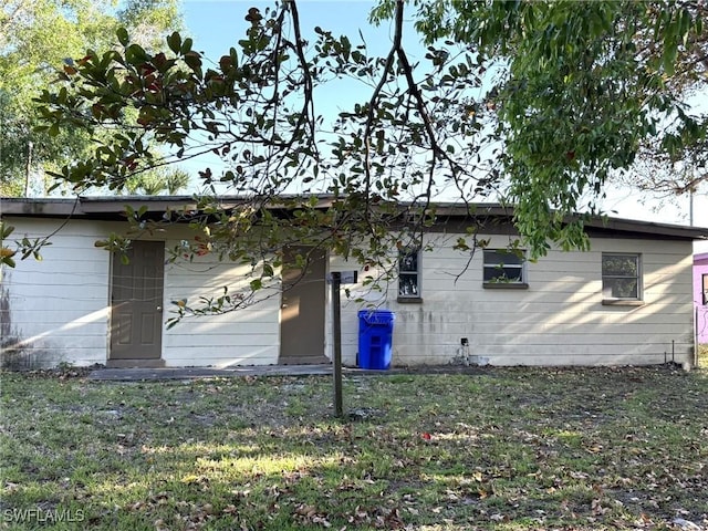 1308 Brookhill Dr, Fort Myers, FL 33916 - view of home's exterior with a yard