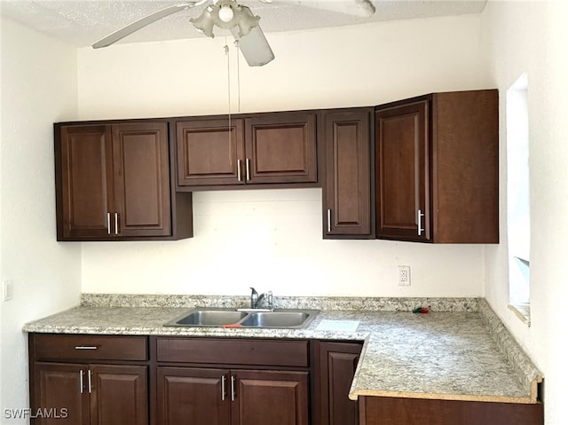 1308 Brookhill Dr, Fort Myers, FL 33916 - kitchen with a ceiling fan, light countertops, a sink, and dark brown cabinetry