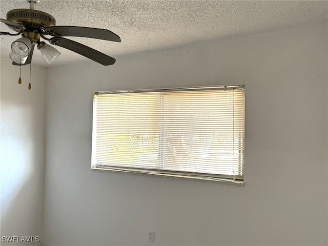 1308 Brookhill Dr, Fort Myers, FL 33916 - room details featuring a textured ceiling and a ceiling fan