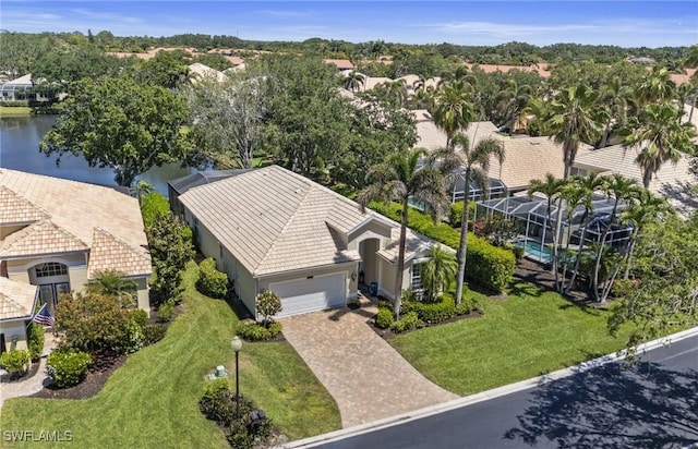 birds eye view of property with a residential view and a water view
