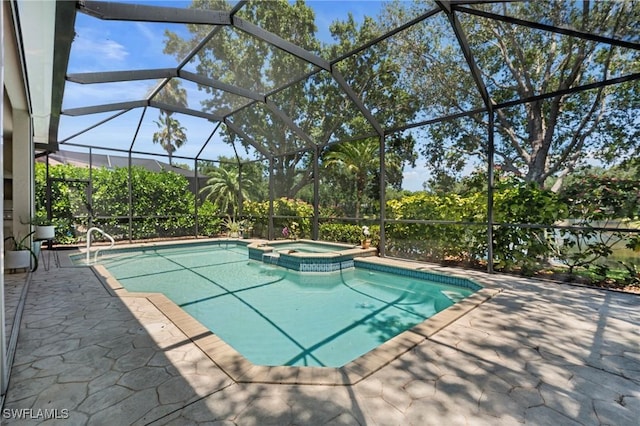 view of pool with glass enclosure, a patio, and a pool with connected hot tub