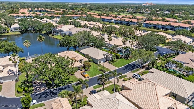 bird's eye view featuring a water view and a residential view