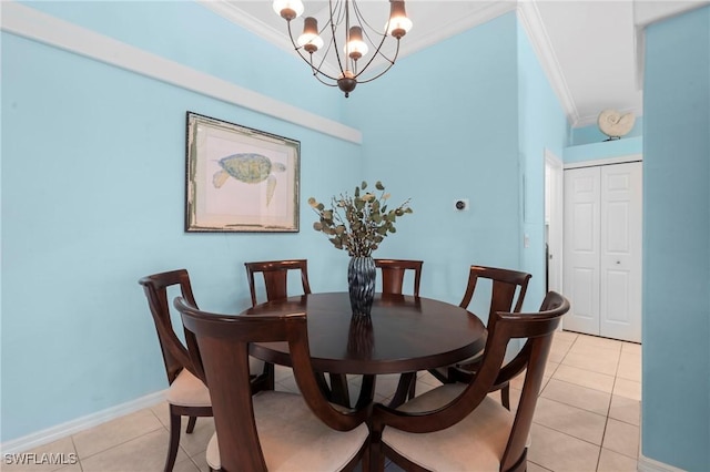 dining room featuring a notable chandelier, baseboards, crown molding, and light tile patterned floors