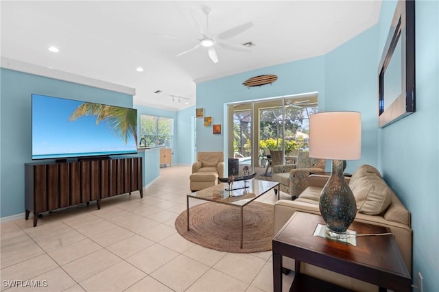 living area featuring recessed lighting, visible vents, light tile patterned flooring, baseboards, and ceiling fan