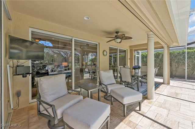view of patio with ceiling fan