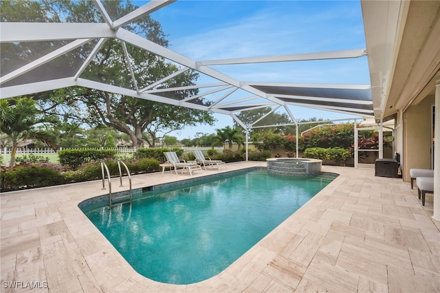 172 Via Napoli, Naples, FL 34105 - view of pool featuring a patio area, a pool with connected hot tub, and glass enclosure