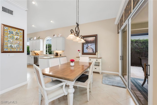 172 Via Napoli, Naples, FL 34105 - dining room with healthy amount of natural light, light tile patterned flooring, baseboards, and recessed lighting
