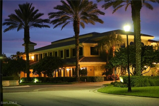 10644 Pelican Preserve Blvd # 101, Fort Myers, FL 33913 - view of front facade featuring stucco siding