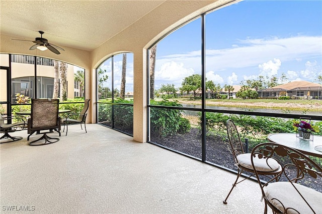 10644 Pelican Preserve Blvd # 101, Fort Myers, FL 33913 - unfurnished sunroom with a textured ceiling and ceiling fan