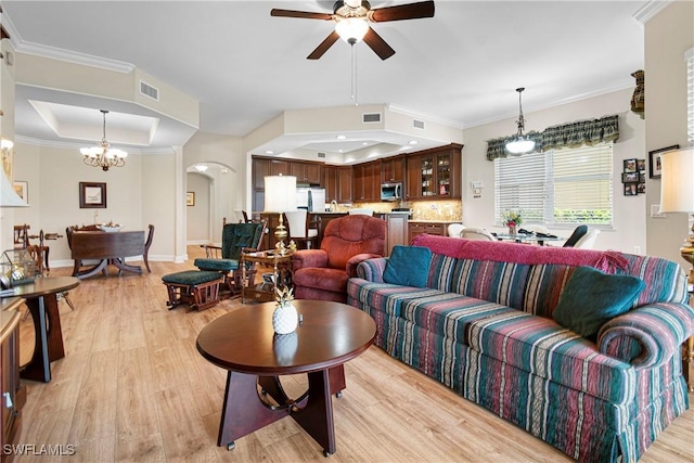 10644 Pelican Preserve Blvd # 101, Fort Myers, FL 33913 - living area featuring ornamental molding, visible vents, light wood-style floors, and ceiling fan with notable chandelier