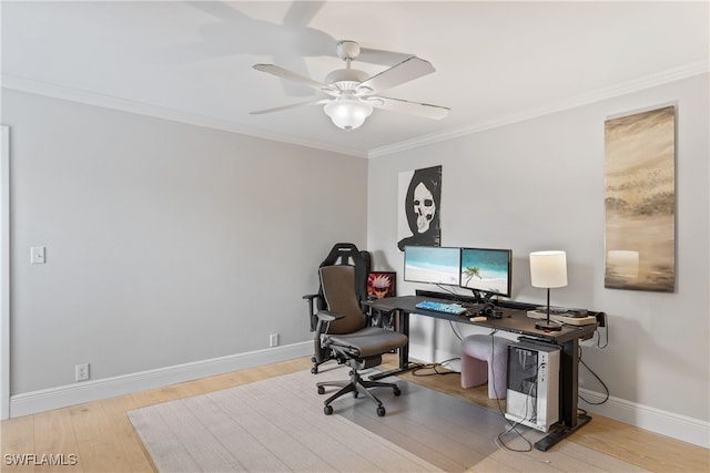 home office featuring baseboards, ornamental molding, wood finished floors, and a ceiling fan