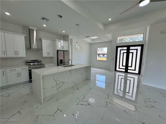 1173 Ebers St E, Lehigh Acres, FL 33974 - kitchen featuring wall chimney range hood, visible vents, stainless steel appliances, marble finish floor, and a sink