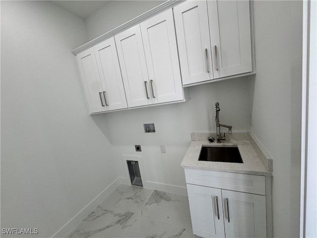 1173 Ebers St E, Lehigh Acres, FL 33974 - washroom featuring hookup for a washing machine, electric dryer hookup, marble finish floor, a sink, and baseboards