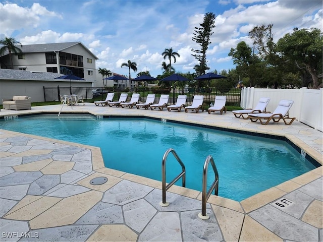 4244 SE 20th Pl Unit 218, Cape Coral, FL 33904 - pool with fence and a patio area