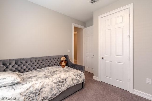 14566 Tropical Dr, Naples, FL 34114 - carpeted bedroom featuring baseboards and visible vents